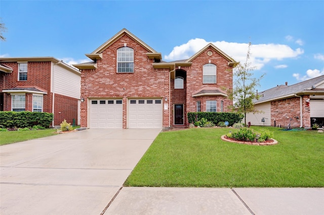 front of property with a garage and a front lawn