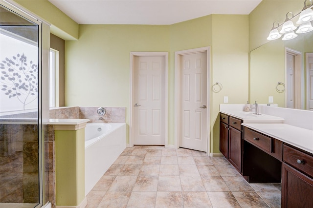 bathroom featuring vanity and plus walk in shower