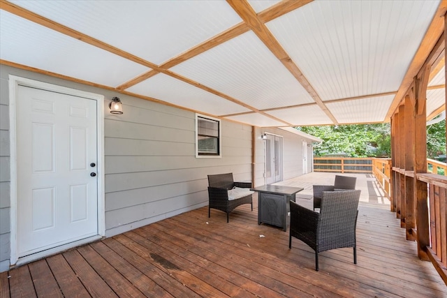 deck featuring outdoor lounge area