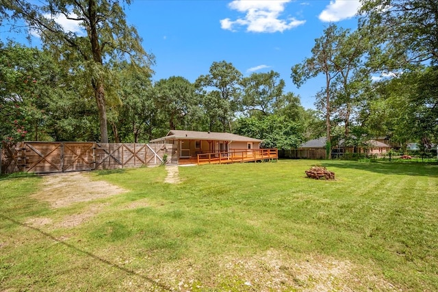 view of yard with a deck