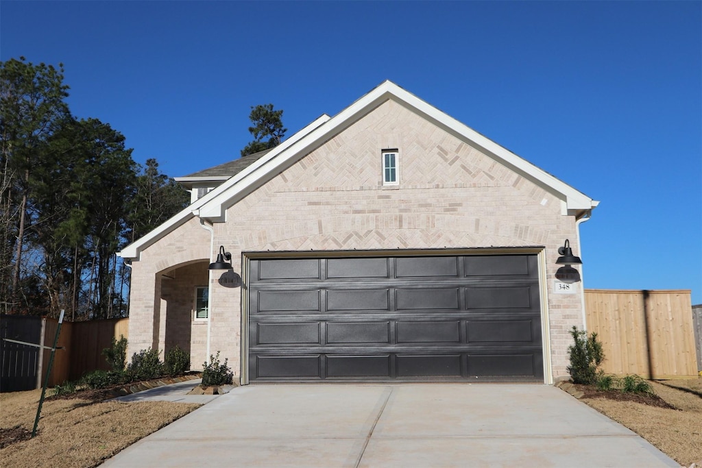 view of front of property featuring a garage