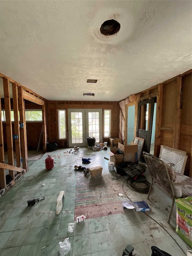 miscellaneous room featuring a textured ceiling