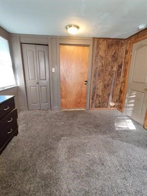 unfurnished bedroom with carpet flooring