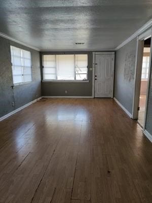 interior space featuring ornamental molding and hardwood / wood-style floors