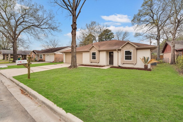 ranch-style home featuring a garage and a front lawn