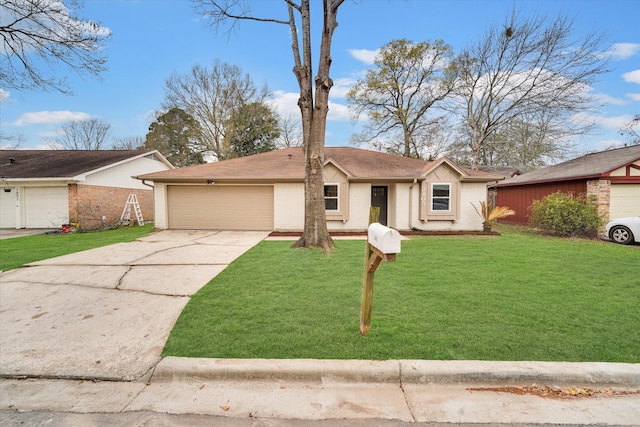 single story home featuring a garage and a front lawn