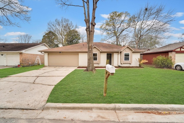 ranch-style home featuring a garage and a front yard