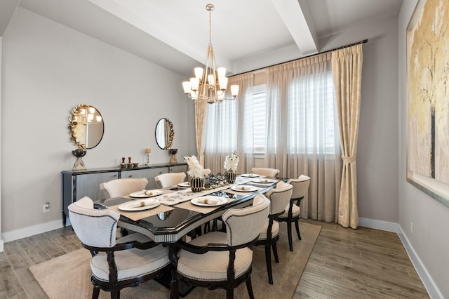 dining space featuring beam ceiling, wood-type flooring, and an inviting chandelier