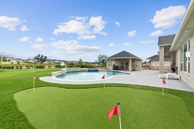 view of swimming pool with a patio area