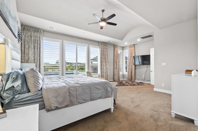 carpeted bedroom featuring lofted ceiling and ceiling fan