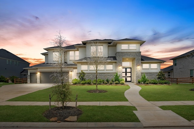 prairie-style house featuring a yard