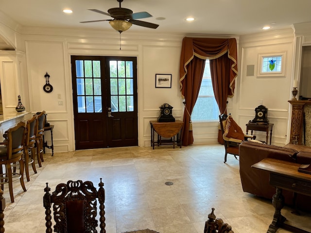 foyer with light tile patterned flooring, french doors, and ceiling fan