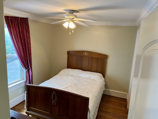 bedroom with ceiling fan, hardwood / wood-style flooring, and ornamental molding