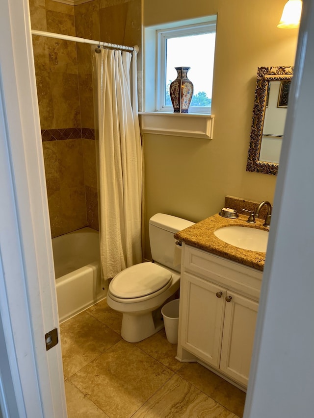 full bathroom with vanity, shower / bath combo, toilet, and tile patterned flooring