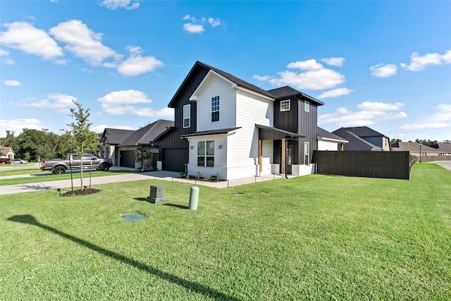 view of side of home with a lawn