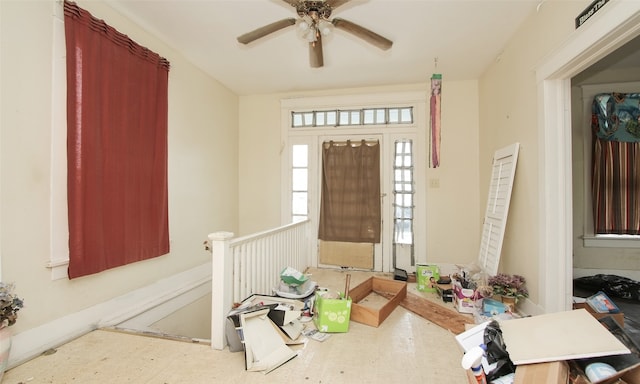 entrance foyer featuring ceiling fan