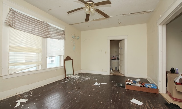 unfurnished room featuring ceiling fan and hardwood / wood-style floors