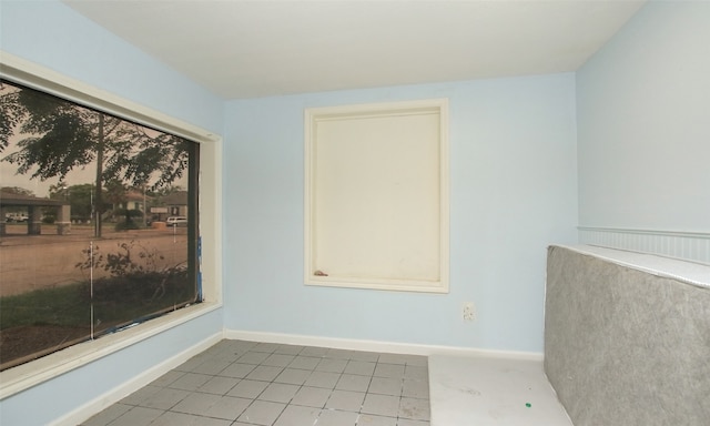 view of tiled spare room