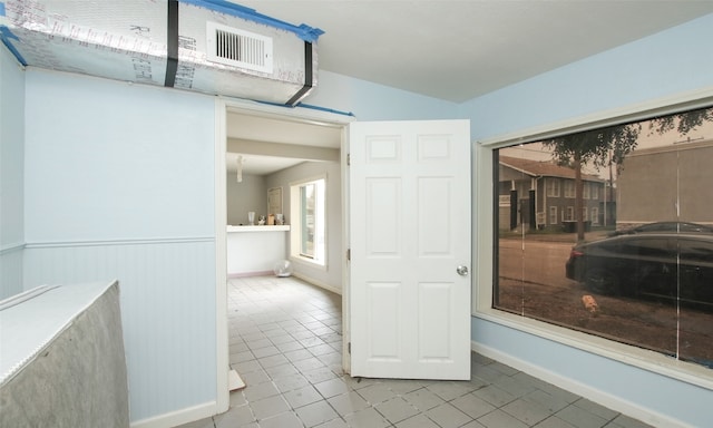 interior space featuring tile patterned flooring