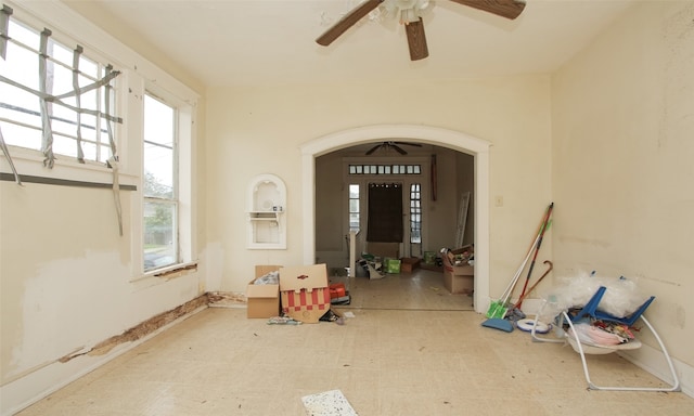 doorway to property featuring ceiling fan