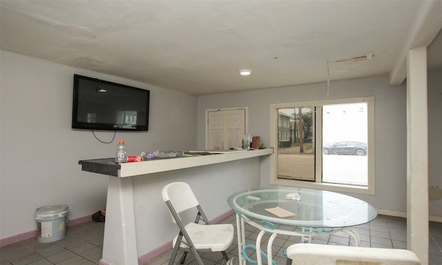 view of tiled dining space