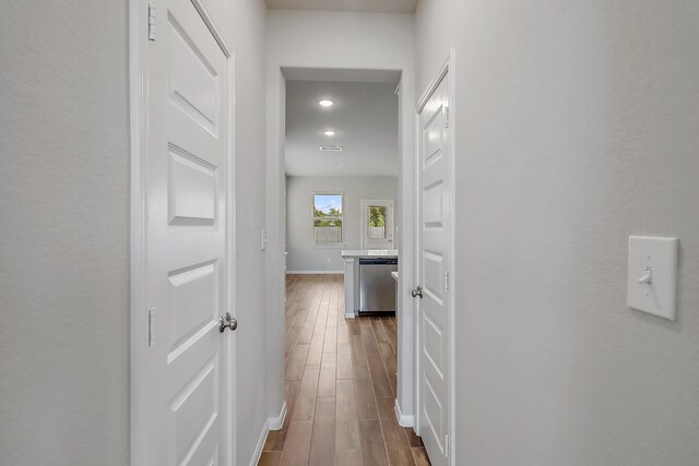 hall featuring hardwood / wood-style flooring