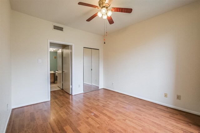 unfurnished bedroom featuring light hardwood / wood-style flooring and ceiling fan