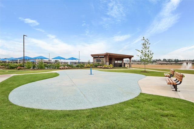 view of home's community with a lawn