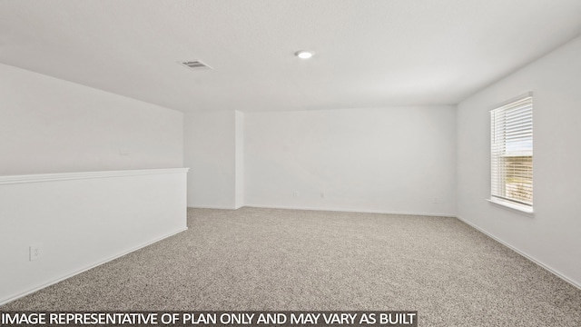 unfurnished room with carpet floors