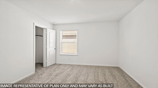 unfurnished bedroom with light colored carpet