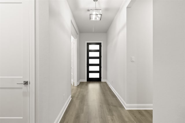 doorway featuring hardwood / wood-style floors