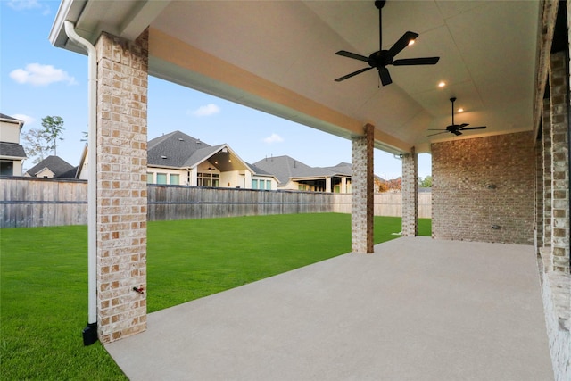 view of patio featuring ceiling fan