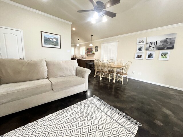 living room featuring ceiling fan and ornamental molding