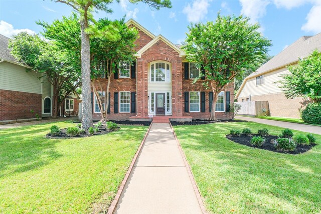 view of front facade with a front lawn