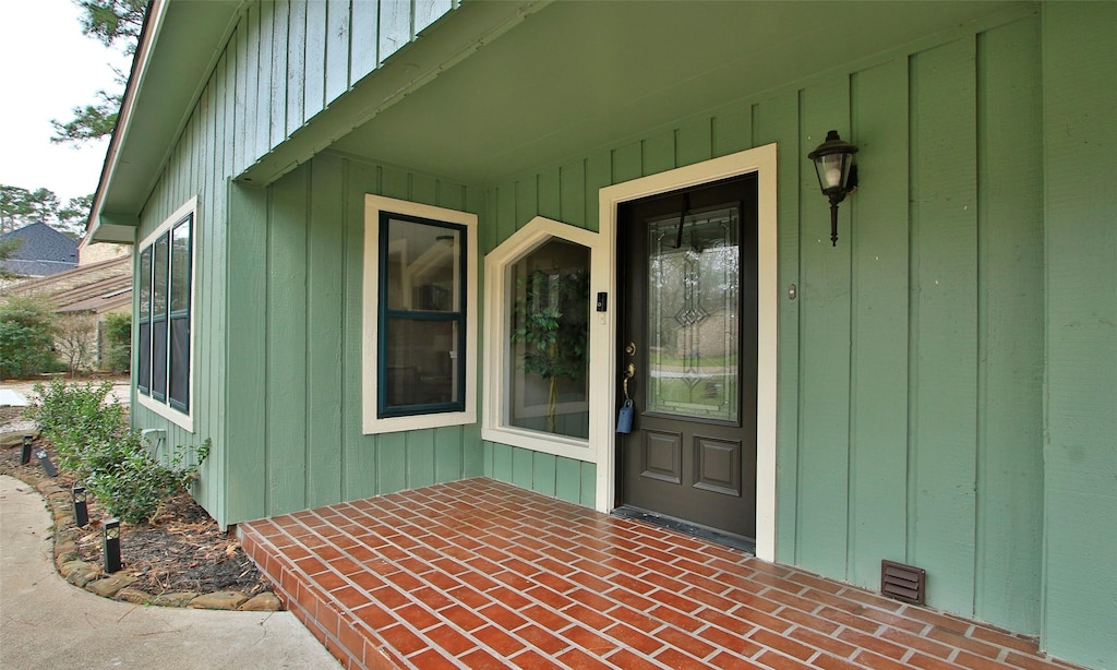 property entrance with a patio