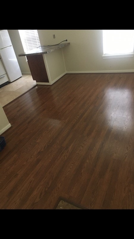 interior space with dark hardwood / wood-style flooring