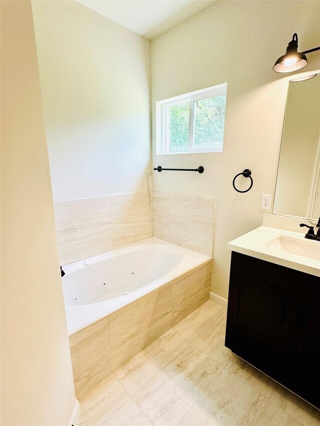 bathroom with tile patterned floors and vanity