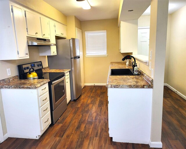 kitchen with white cabinets, dark hardwood / wood-style floors, electric range, and sink