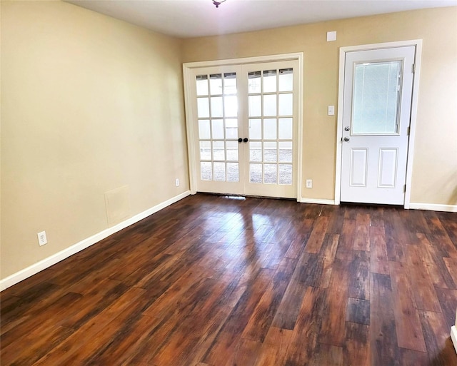 interior space featuring dark wood-type flooring, a healthy amount of sunlight, and french doors