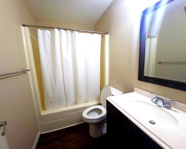 full bathroom with hardwood / wood-style flooring, vanity, toilet, and shower / tub combo