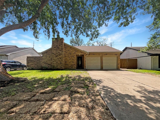 single story home featuring a garage and a front yard