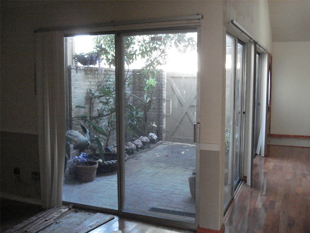 doorway to outside featuring hardwood / wood-style floors