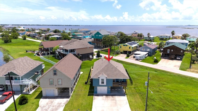 bird's eye view with a water view