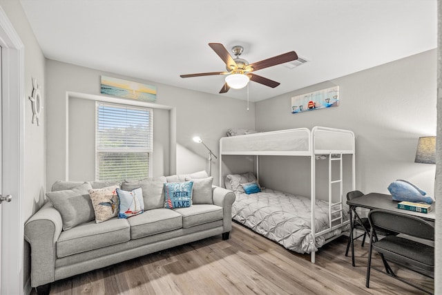 bedroom featuring ceiling fan and hardwood / wood-style floors