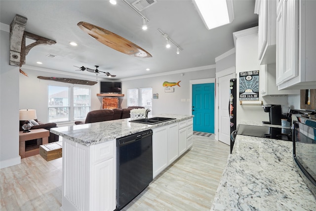 kitchen featuring ornamental molding, sink, black appliances, and track lighting