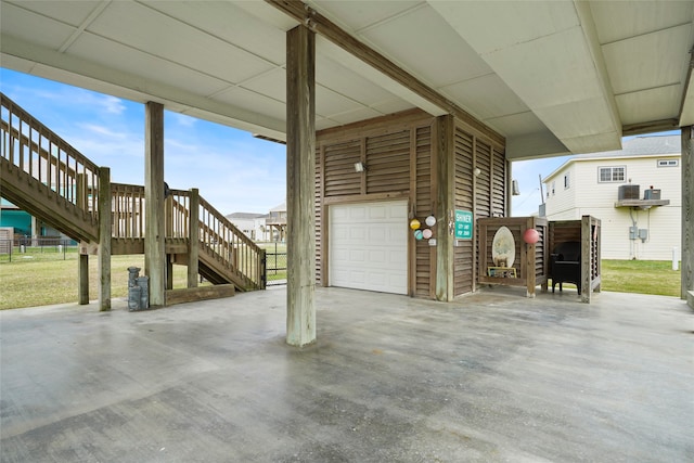 view of patio with a garage