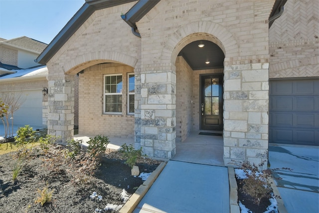 property entrance with a garage