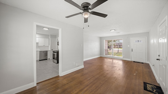 interior space featuring light wood-type flooring and ceiling fan