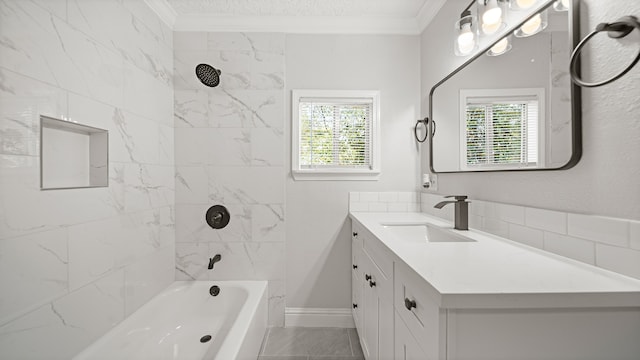 bathroom featuring tiled shower / bath combo, vanity, plenty of natural light, and crown molding