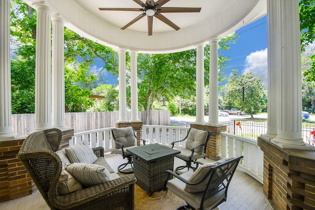 view of patio featuring ceiling fan